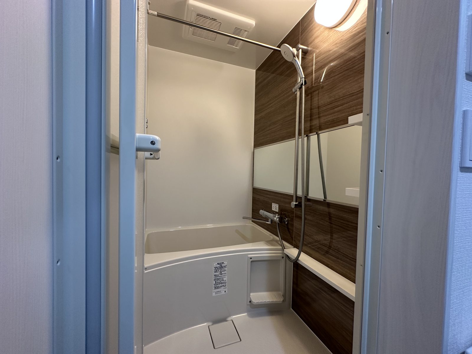 Private bathroom with bathtub and shower